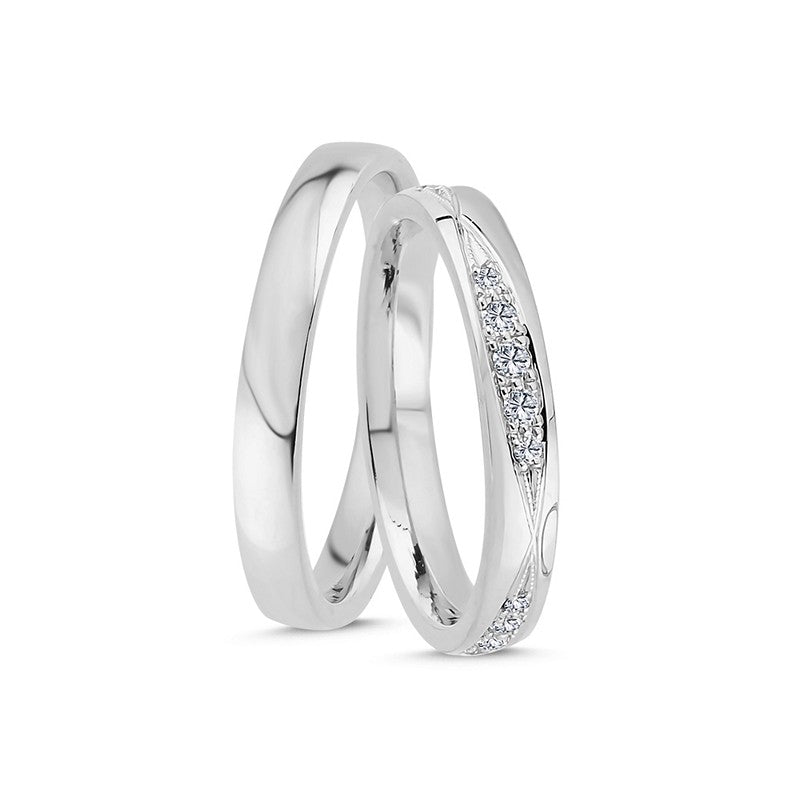 Eksklusive Nuran vielsesringe i 14 karat hvidguld med 0,26 ct diamanter – klassisk design med let buet profil og 3,3 mm bredde.